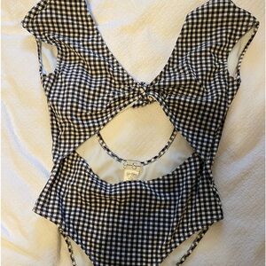 Jessica Simpson One Piece Swim Suit. Adorable shoulder straps and cheeky bottom